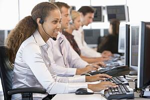 Stock Traders Working At Computers