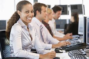 Stock Traders Working At Computers