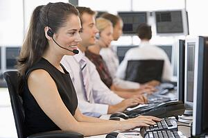 Stock Traders Working At Computers