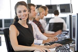 Stock Traders Working At Computers