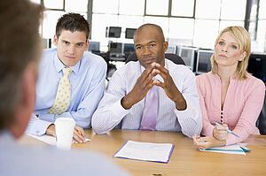 Stock Traders Conducting Interview