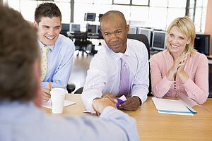 Stock Traders Conducting Interview