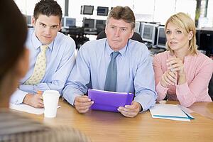 Stock Traders Conducting Interview