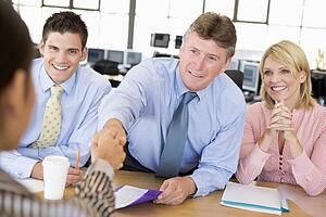 Stock Traders Conducting Interview
