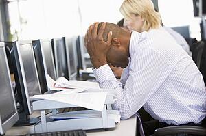 Stock Trader Looking Frustrated
