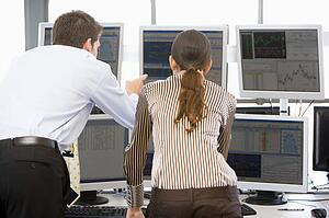 Stock Traders Viewing Monitors
