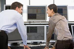Stock Traders Viewing Monitors
