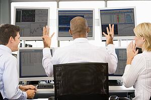 Stock Traders Viewing Monitors