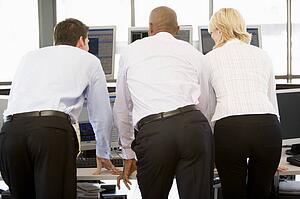 Stock Traders Viewing Monitors