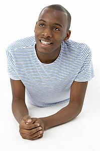 Teenage Boy Laying On Stomach