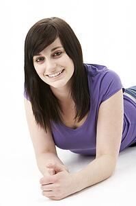 Young Woman Laying On Stomach