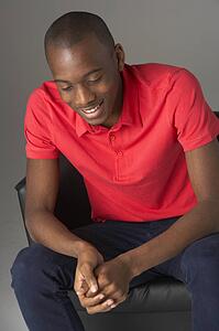 Teenage Boy Seated In Studio