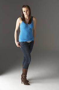 Teenage Girl Standing In Studio