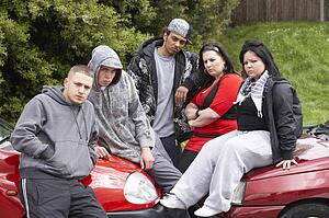 Gang Of Youths Sitting On Cars