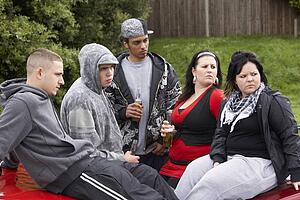 Gang Of Youths Sitting On Cars