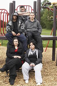 Group Of Young People In Playground