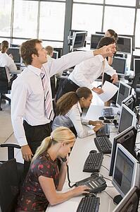 High Angle View Of Stock Traders At Work