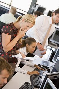 Woman Looking At Stock Reports