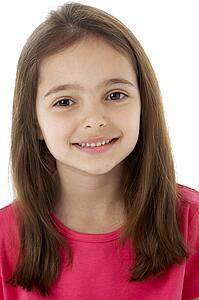 Studio Portrait of Smiling Girl