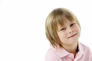 Studio Portrait of Smiling Boy