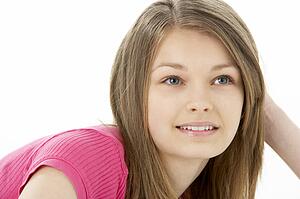 Studio Portrait of Smiling Teenage Girl