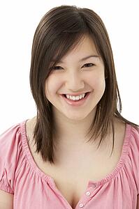 Studio Portrait of Smiling Teenage Girl