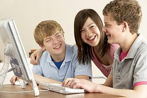 Teenagers on Computer at Home