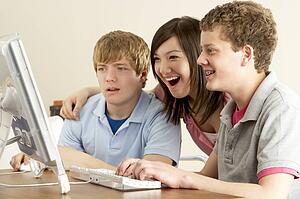 Teenagers on Computer at Home