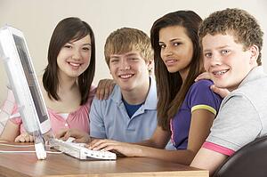 Teenagers on Computer at Home