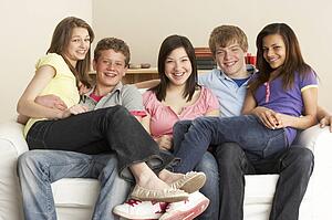 Teenage Friends Relaxing at Home