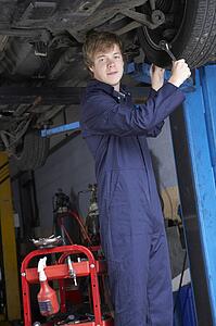 Mechanic working on car