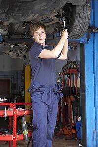 Mechanic working on car