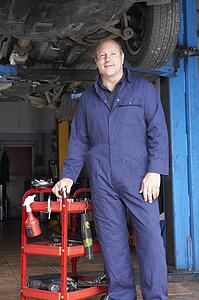 Mechanic working on car