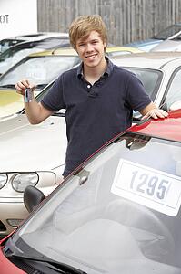Young man collecting new car