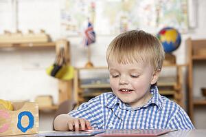 Young Girl Playing at Montessori/Pre-School