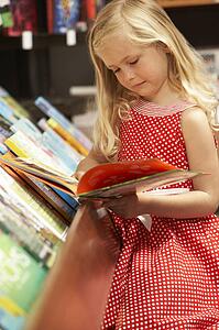 Young girl in bookshop