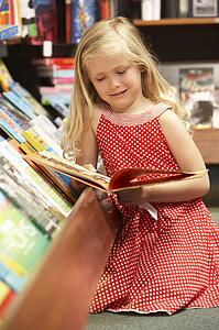 Young girl in bookshop