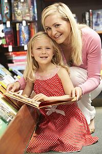 Mother and daughter in bookshop