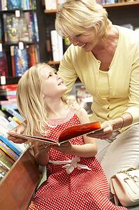 Grandmother and grandaughter in bookshop