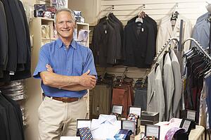 Male sales assistant in clothing store