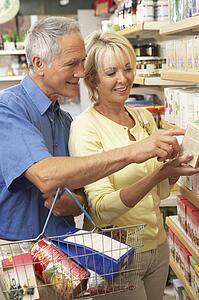 Middle aged couple buying herbal tea