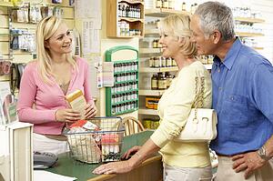 Female sales assistant in health food store