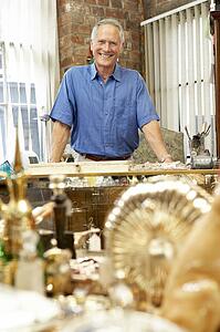 Male antique shop proprietor