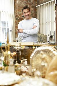 Male antique shop proprietor