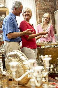 Couple shopping in antique shop