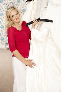Bride choosing wedding dress
