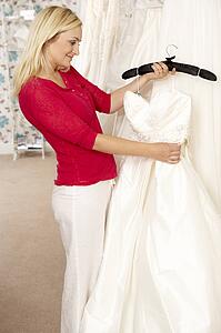 Bride choosing wedding dress