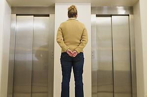 Woman waiting for an elevator