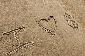 I love money written in sand