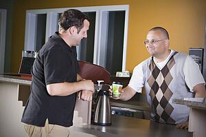 Man pouring coffee